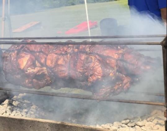 Pig roast on rotisserie